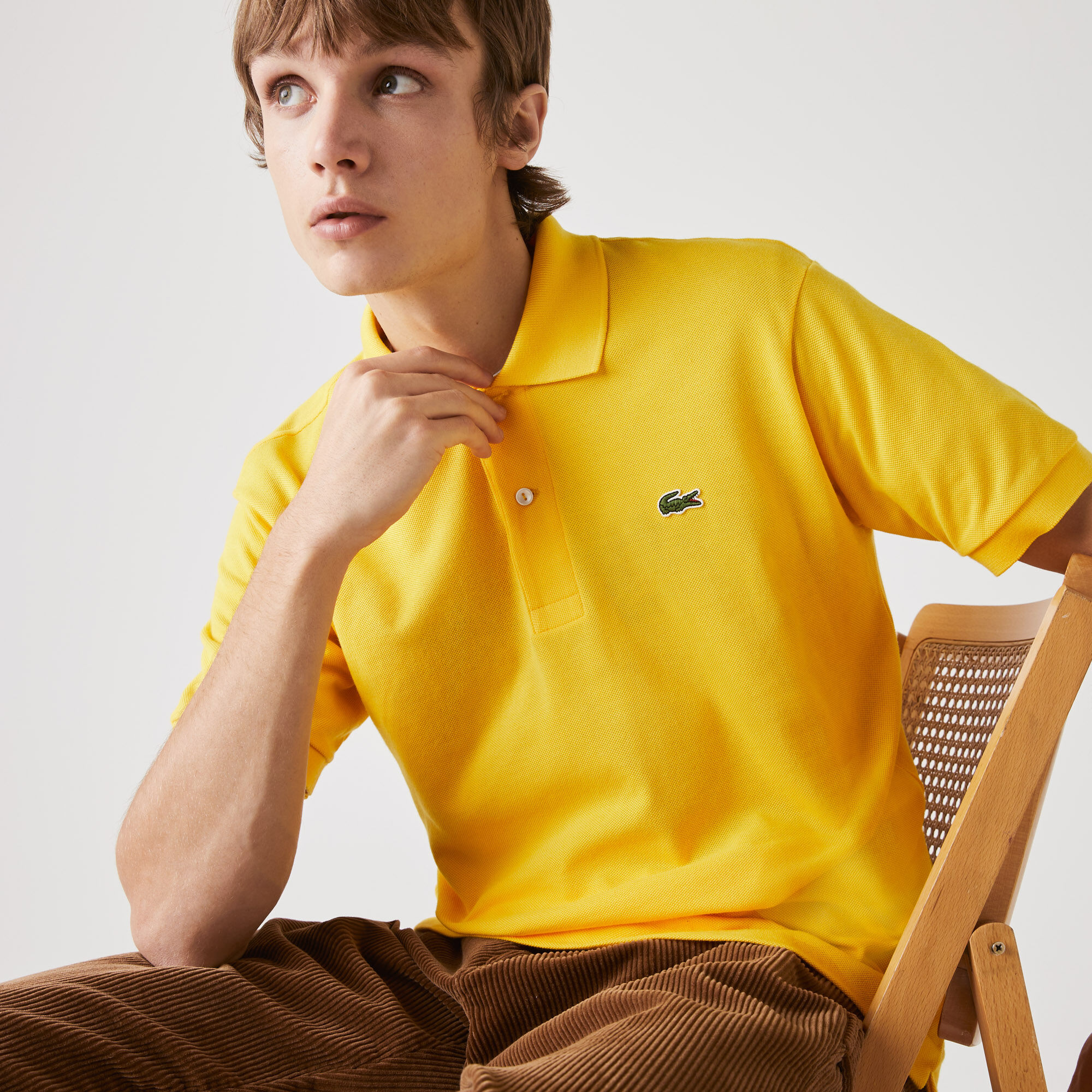 university gold lacoste shirt